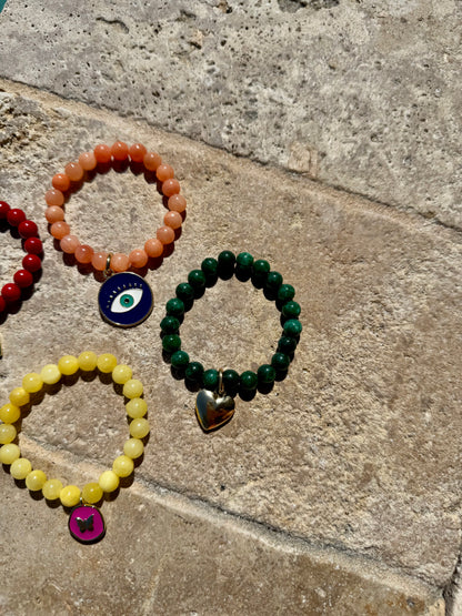 Colorful beaded armparty bracelet stack by AVINZIA — handmade coastal jewelry