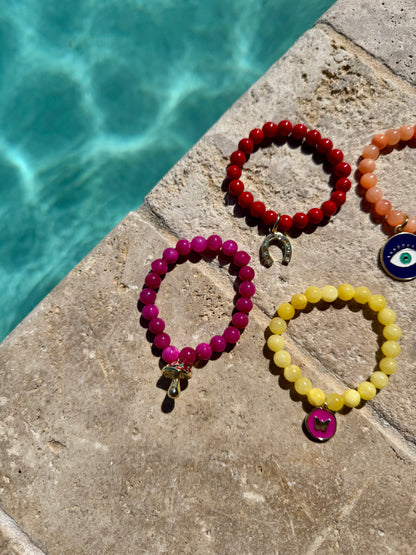 Colorful beaded armparty bracelet stack by AVINZIA