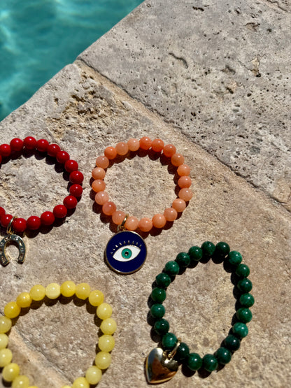 Colorful beaded armparty bracelet stack by AVINZIA — handmade coastal jewelry