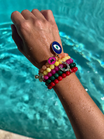 Colorful beaded armparty bracelet stack — handmade in Florida by AVINZIA