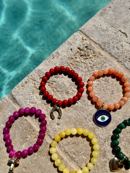 Colorful beaded armparty bracelet stack — handmade in Florida by AVINZIA
