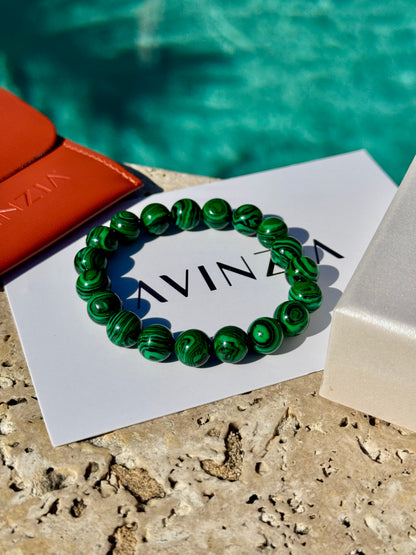 Polished malachite beads with signature swirls – AVINZIA