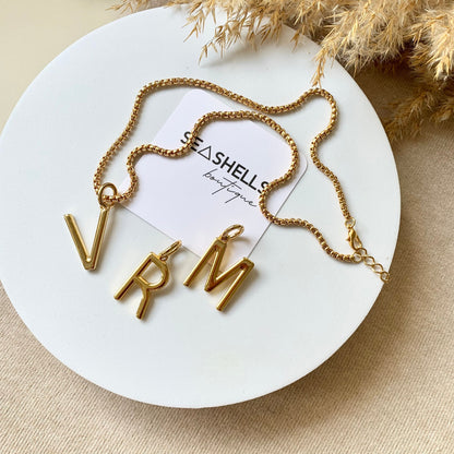 Box chain necklace with monogram letter charm