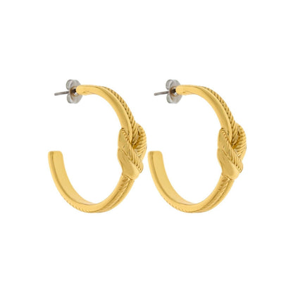 Lightweight gold hoop earrings detail