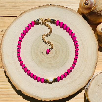 Bright rainbow bead necklace close-up