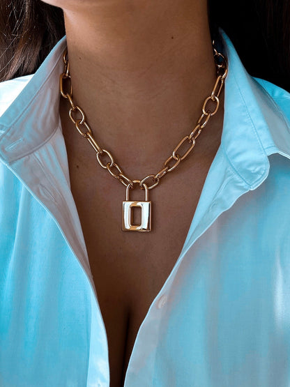 Gold lock necklace and bracelet set