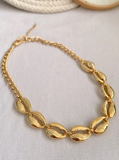 Cowrie shell choker necklace in gold finish