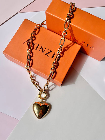 Dimensional puff heart necklace worn