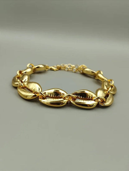 Cowrie shell coastal jewelry with tarnish-resistant finish