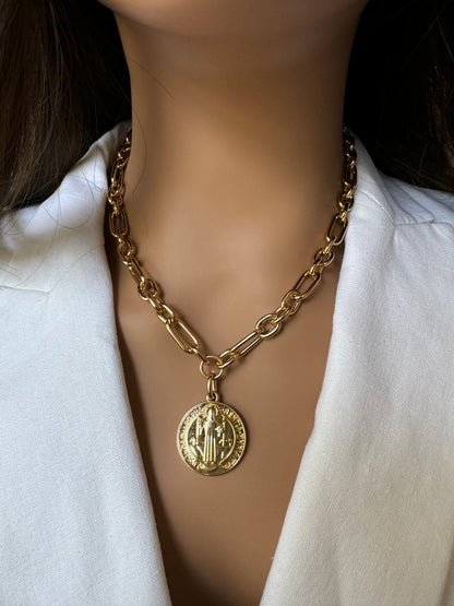 St. Benedict coin medallion necklace layered with an initial chain - AVINZIA