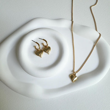 Gold heart charm earrings and necklace set by AVINZIA — handmade coastal jewelry