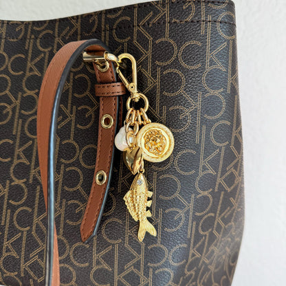 Lion and fish gold bag charm and keychain purse accessory — handmade in Florida by AVINZIA
