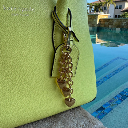 Waterfall keychain with three gold puffy heart charms for bags — gift-ready handmade jewelry by AVINZIA