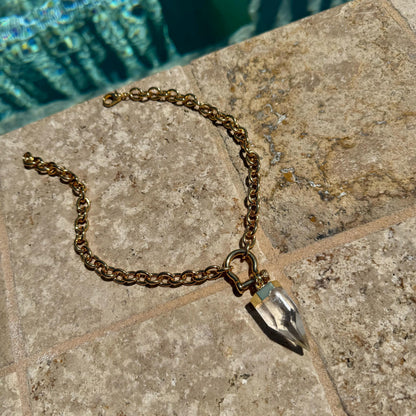 Crystal quartz point pendant necklace on chunky rolo shackle chain by AVINZIA