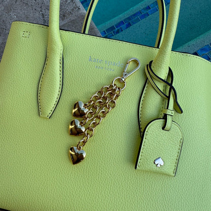 Waterfall keychain with three gold puffy heart charms for bags — handmade in Florida by AVINZIA