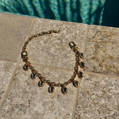 Cowrie shell purse chain and convertible necklace in gold — handmade in Florida by AVINZIA