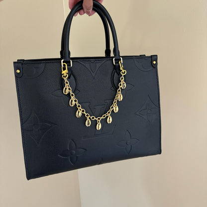 Cowrie shell purse chain and convertible necklace in gold — gift-ready handmade jewelry by AVINZIA