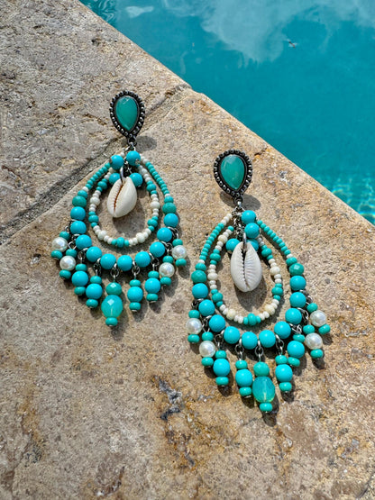 Beaded chandelier earrings in turquoise or silver tones — handmade in Florida by AVINZIA