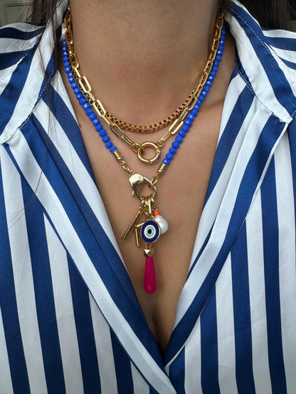Royal blue beaded necklace with gold chain stack options by AVINZIA