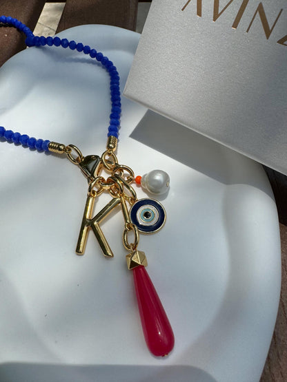 Royal blue beaded necklace with gold chain stack options by AVINZIA — handmade coastal jewelry
