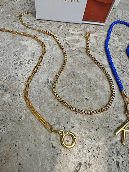 Royal blue beaded necklace with gold chain stack options — gift-ready handmade jewelry by AVINZIA