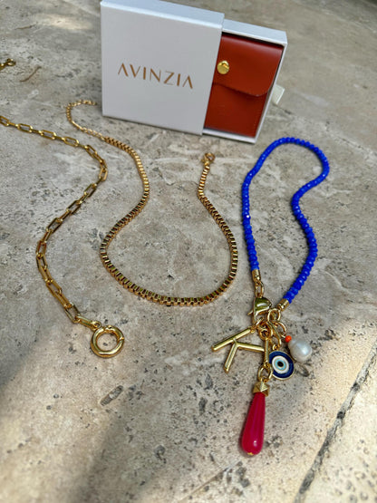 Royal blue beaded necklace with gold chain stack options — AVINZIA handmade jewelry