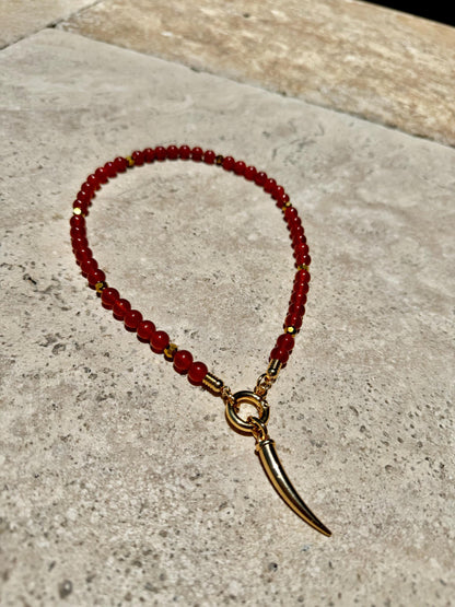 Carnelian beaded gemstone necklace with gold tooth charm — handmade in Florida by AVINZIA