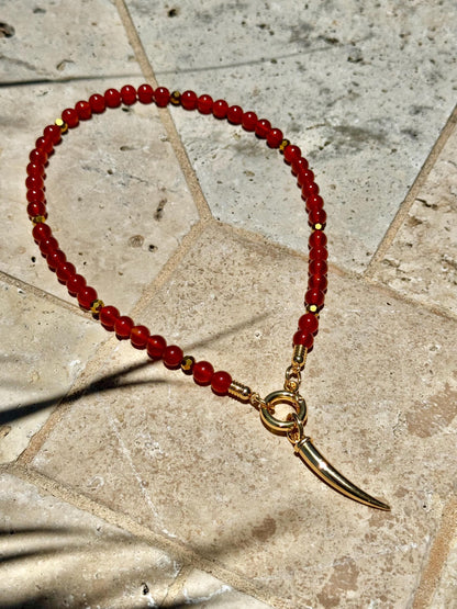 Carnelian beaded gemstone necklace with gold tooth charm by AVINZIA