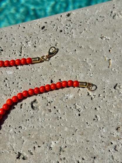 Faux tusk horn charm necklace with colorful summer beads — handmade in Florida by AVINZIA