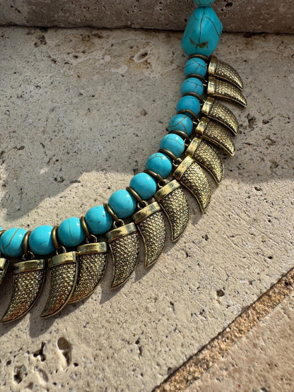 Antique brass tusk charm necklace with turquoise beaded choker — gift-ready handmade jewelry by AVINZIA