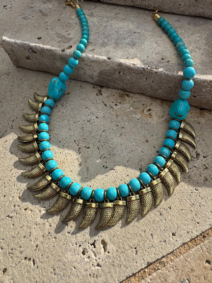 Antique brass tusk charm necklace with turquoise beaded choker — handmade in Florida by AVINZIA