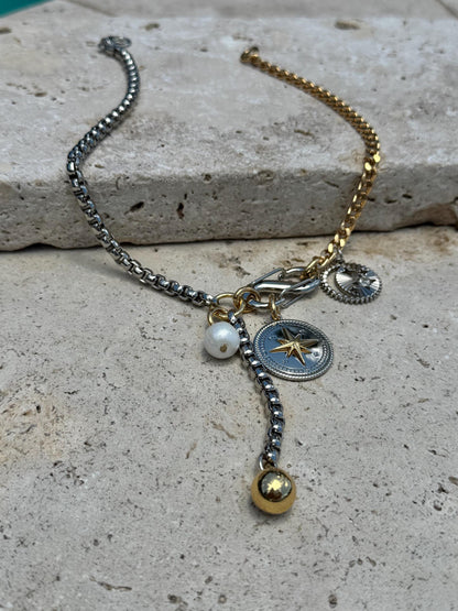 Multiple charm necklace with interchangeable fish and compass charms by AVINZIA