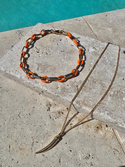 Gold tusk charm necklace with orange enamel choker option — handmade in Florida by AVINZIA
