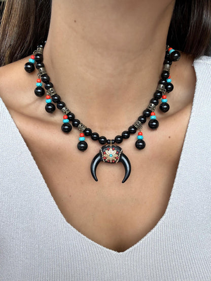 Black obsidian beaded necklace with crescent moon charm by AVINZIA