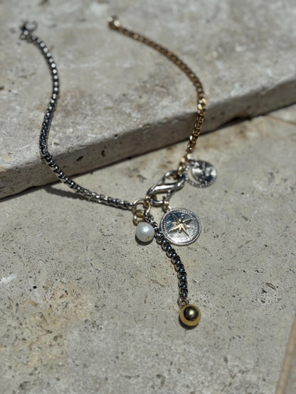 Multiple charm necklace with interchangeable fish and compass charms — handmade in Florida by AVINZIA
