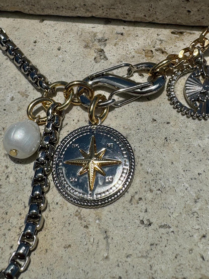 Multiple charm necklace with interchangeable fish and compass charms by AVINZIA — handmade coastal jewelry