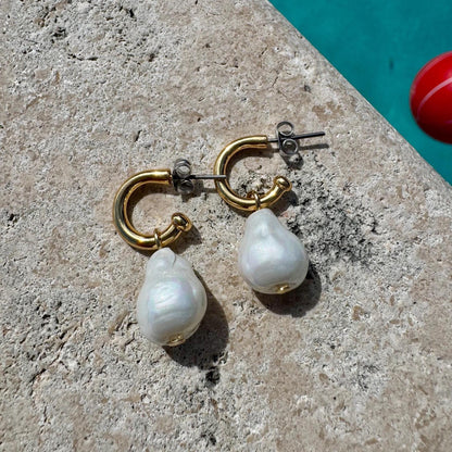 Hoop earrings with removable pearl, fish and tusk charms by AVINZIA