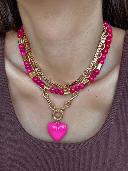 Pink layered necklace set with puffed heart charm by AVINZIA — handmade coastal jewelry