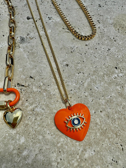 Heart charm necklace set with orange evil eye chain option by AVINZIA — handmade coastal jewelry