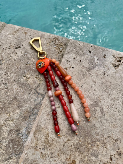 Gemstone beaded bag charm with evil eye accent by AVINZIA