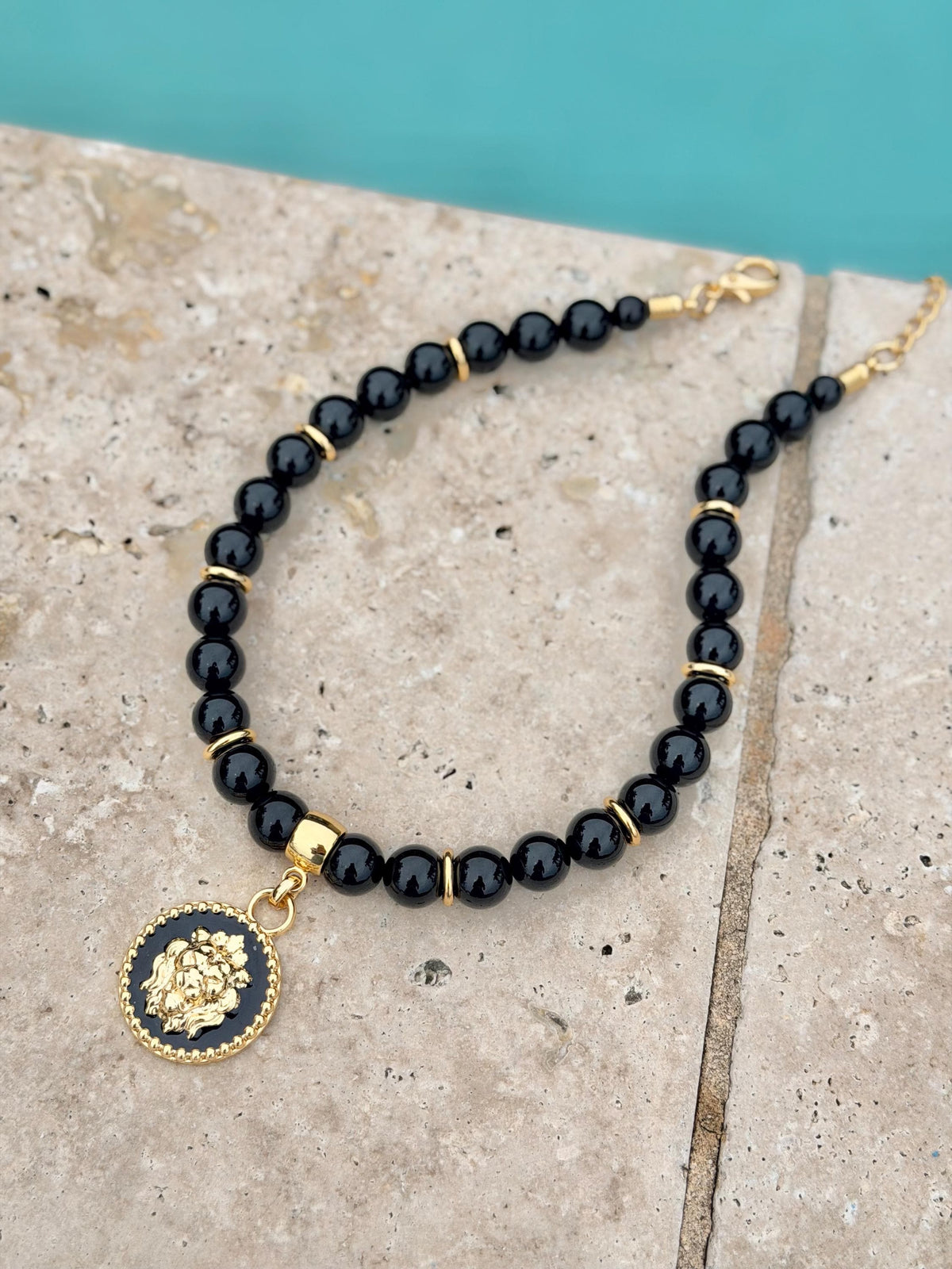 Black onyx lion necklace — handmade in Florida by AVINZIA (photo 7)